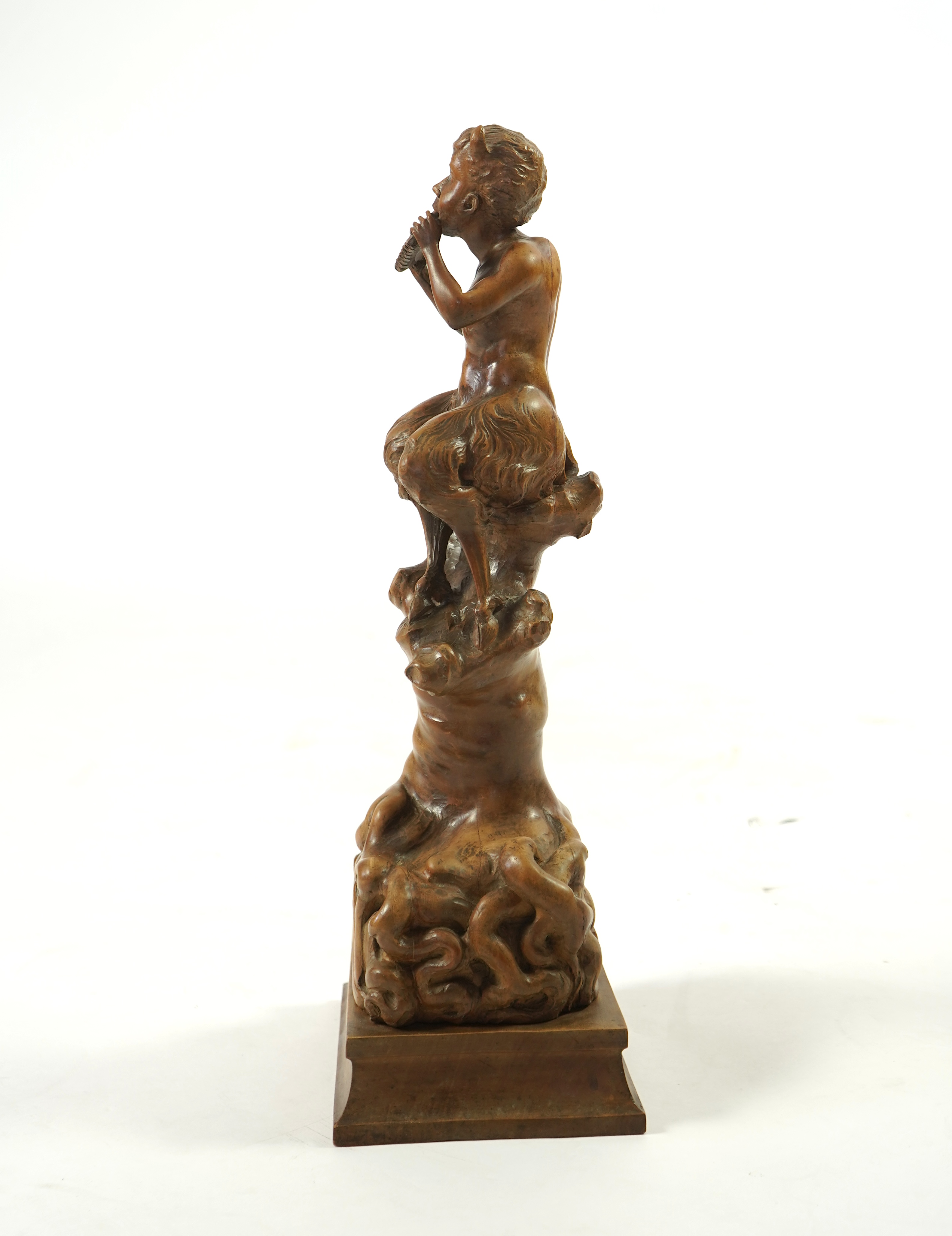 A late 19th century French carved walnut figure of Pan